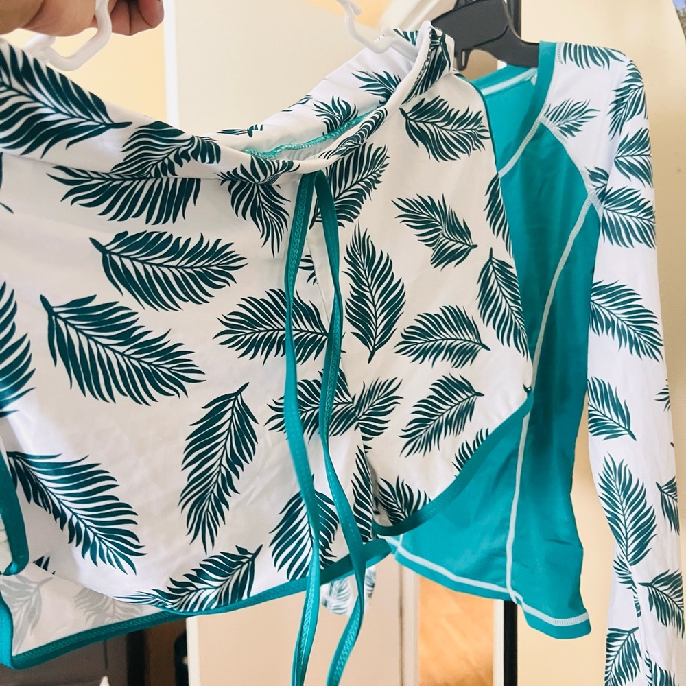 Swimsuit/ shorts and long sleeve shirts